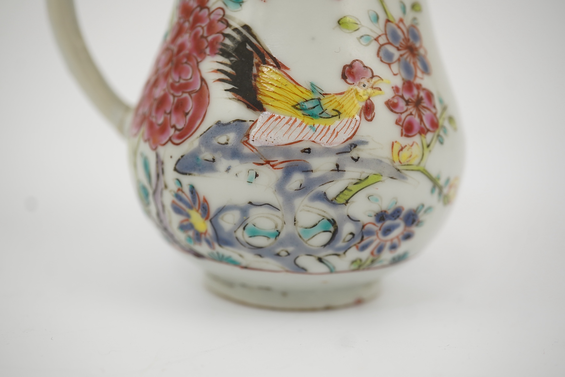 A Chinese famille rose ‘cockerel’ cream jug and cover, Yongzheng period